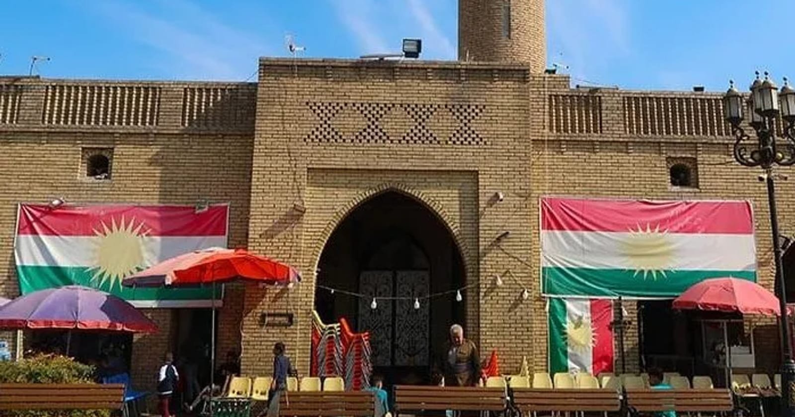 The historic centre of Erbil, with Kurdish flags hung across the frontage